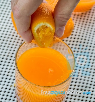 Squeezed Orange Juice Shows Fruit Tropical And Drink Stock Photo