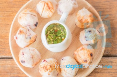 Squid Grilled Ball On Wooden Plate Stock Photo