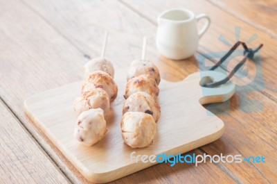 Squid Grilled Ball On Wooden Plate Stock Photo