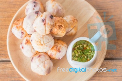 Squid Grilled Ball On Wooden Plate Stock Photo