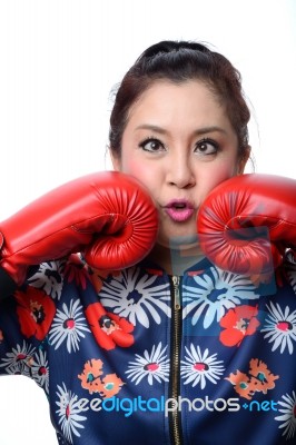 Squint Eyed Crazy Woman In Boxing Gloves Stock Photo