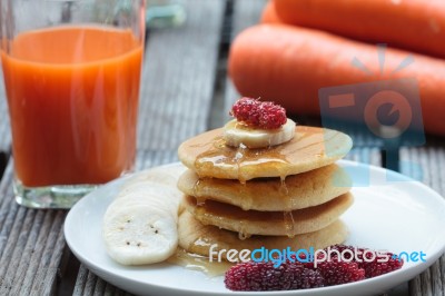 Stack Of Delicious Pancakes With Fresh Fruits Stock Photo