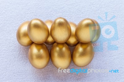 Stack Of Golden Easter Egg Stock Photo