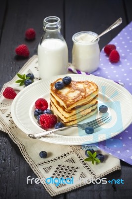 Stack Of Heart Shaped Pancakes With Fresh Berries Stock Photo