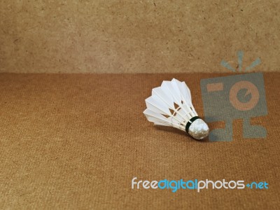 Stained Shuttlecock On A Wooden Board Stock Photo