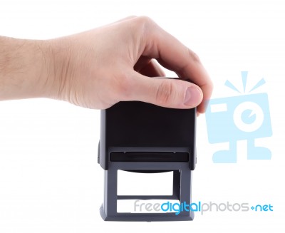 Stamp In Businessman Hand Isolated On White, Clipping Path Stock Photo