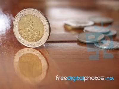 Stand Thai Coins On Wood Table Stock Photo