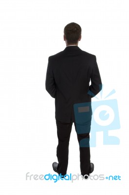 Standing Businessman Posing From Back Stock Photo