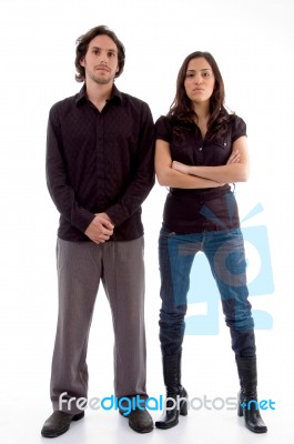 Standing Couple Looking At Camera Stock Photo