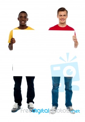 Standing Guys Holding Blank Board Stock Photo