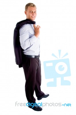 Standing Man Holding His Coat Stock Photo