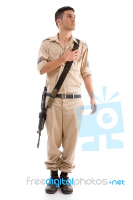 Standing Soldier With Gun Stock Photo