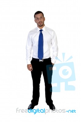 Standing Young Businessman Stock Photo