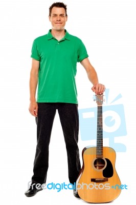 Standing Young Guitarist Stock Photo