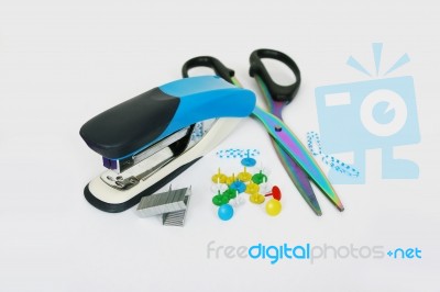 Stapler, Scissors, Thumbtacks, Paper Clips On A Light Background… Stock Photo