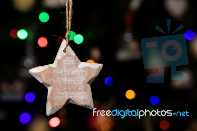 Star Shape Of Christmas Ornaments Hanging On Christmas Tree Stock Photo