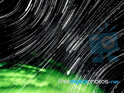 Star Trails In Dark Night Stock Photo