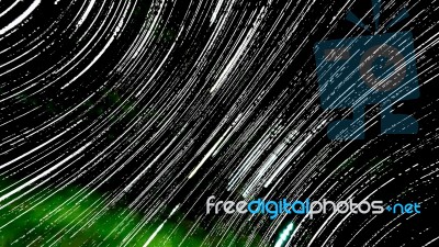 Star Trails In Dark Night Stock Photo