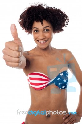 Stars And Stripes Bikini Model Showing Thumbs Up Stock Photo