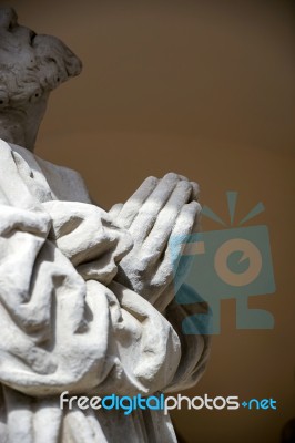 Statue Of A Man Outside St James Church In Rothenburg Stock Photo