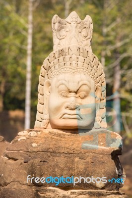 Statue Of Ancient Khmer Warrior Head At Angkor Wat Stock Photo