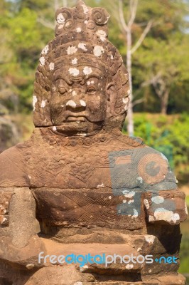 Statue Of Ancient Khmer Warrior Head At Angkor Wat Stock Photo