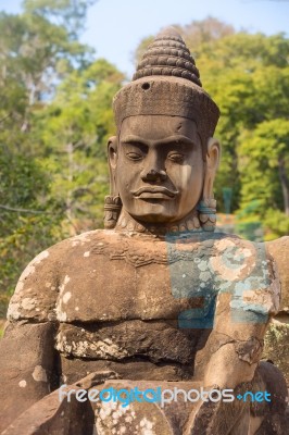 Statue Of Ancient Khmer Warrior Head At Angkor Wat Stock Photo