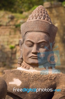 Statue Of Ancient Khmer Warrior Head At Angkor Wat Stock Photo