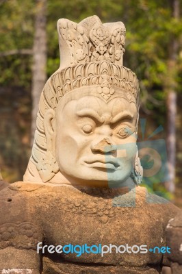 Statue Of Ancient Khmer Warrior Head At Angkor Wat Stock Photo