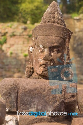 Statue Of Ancient Khmer Warrior Head At Angkor Wat Stock Photo