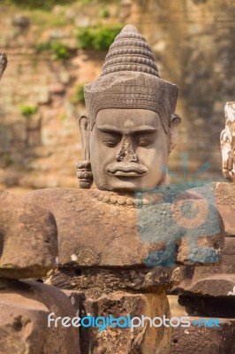 Statue Of Ancient Khmer Warrior Head At Angkor Wat Stock Photo