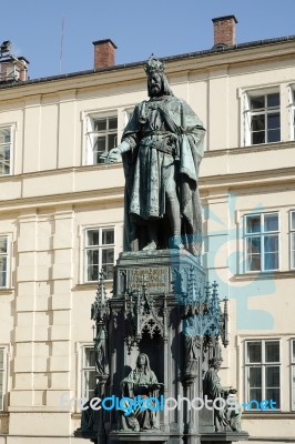 Statue Of King Charles Iv At The Entrance To The Charles Bridge Stock Photo