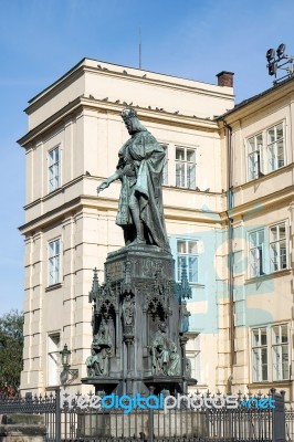 Statue Of King Charles Iv At The Entrance To The Charles Bridge Stock Photo