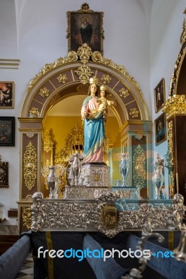 Statue Of Madonna And Child In The Church Of The Encarnacion In Stock Photo