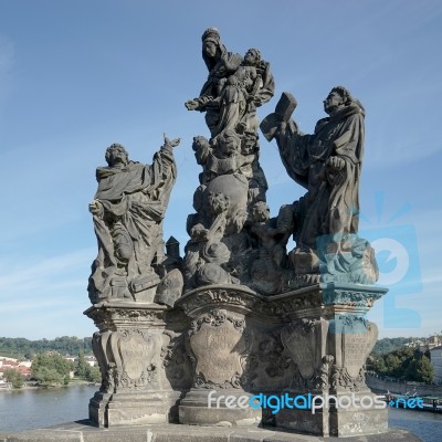 Statue Of Saints Dominic And Thomas On Charles Bridge In Prague Stock Photo