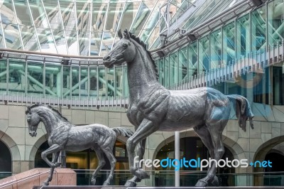 Statues Of Two Magnificent Horses At Minster Court London Stock Photo