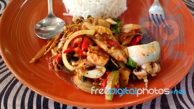 Steamed Rice With Spicy Fried Stir Sea Food, Thai Food Stock Photo