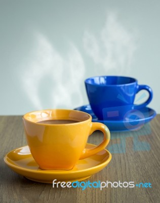 Steaming Coffee Cup On Table Stock Photo