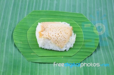 Sticky Rice With Steamed Custard On Banana Leaves, Sweet Sticky Rice, Thai Sweet Dessert, Original Thai Food Stock Photo