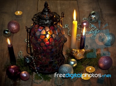 Still Life Of Christmas Ornaments On Wooden Floor Stock Photo