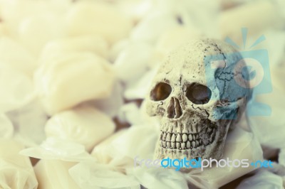 Still Life Of Human Skull With Candy Stock Photo