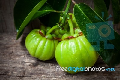 Still Life With Fresh Garcinia Cambogia On Wooden Background (th… Stock Photo