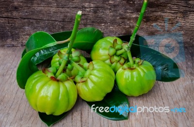 Still Life With Fresh Garcinia Cambogia On Wooden Background (th… Stock Photo