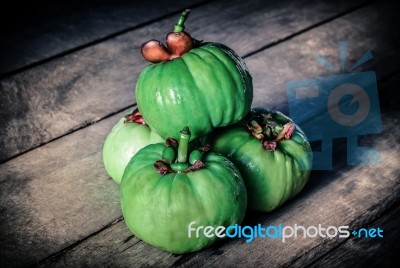 Still Life With Fresh Garcinia Cambogia On Wooden Background (th… Stock Photo