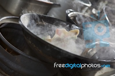 Stir Fry In Wok Stock Photo