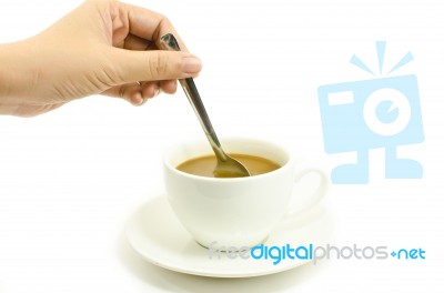 Stirring Coffee With Spoon Stock Photo