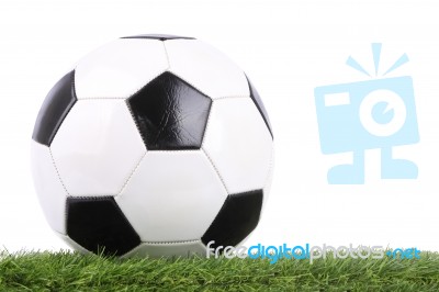 Stitch Leather Soccer Ball On Green Grass Stock Photo