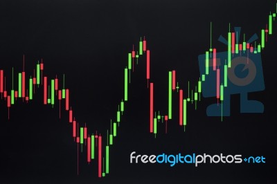 Stock Or Forex Graph Or Candlestick Chart On Black Screen Stock Photo