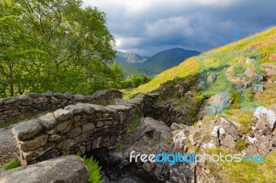 Stone Bridge Over A Stream In The Lake District Stock Photo