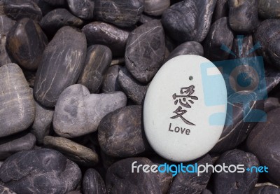 Stone Engraved With Word Love Stock Photo